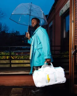 CLOUDY WITH A CHANCE OF SHARK DUFFLE